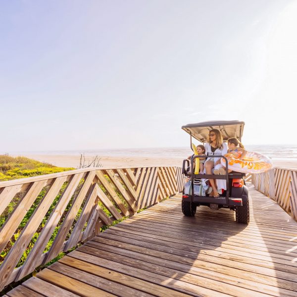 Family On Golf Cart Using Dune Crossover
